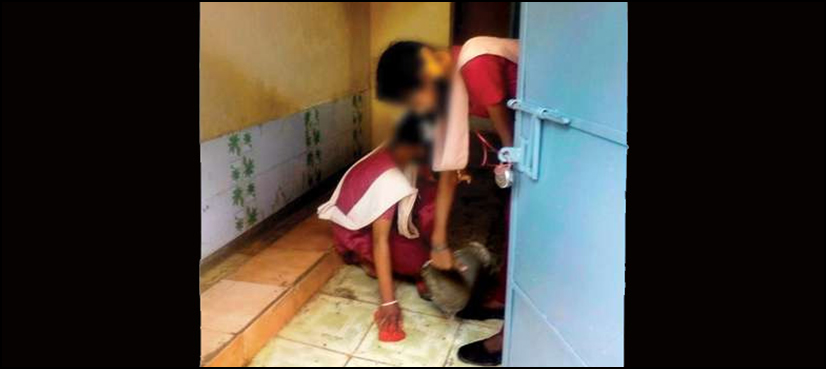 students clean toilet india