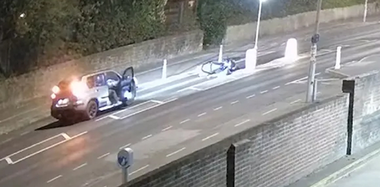 fake motorbike crash motorcyclist teenager emergency services cctv footage