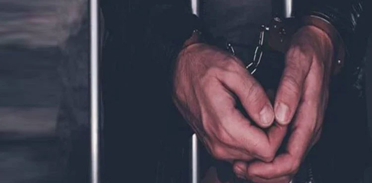 army official, arrest, blackmailing, Karachi,